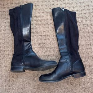 Knee high black leather boots